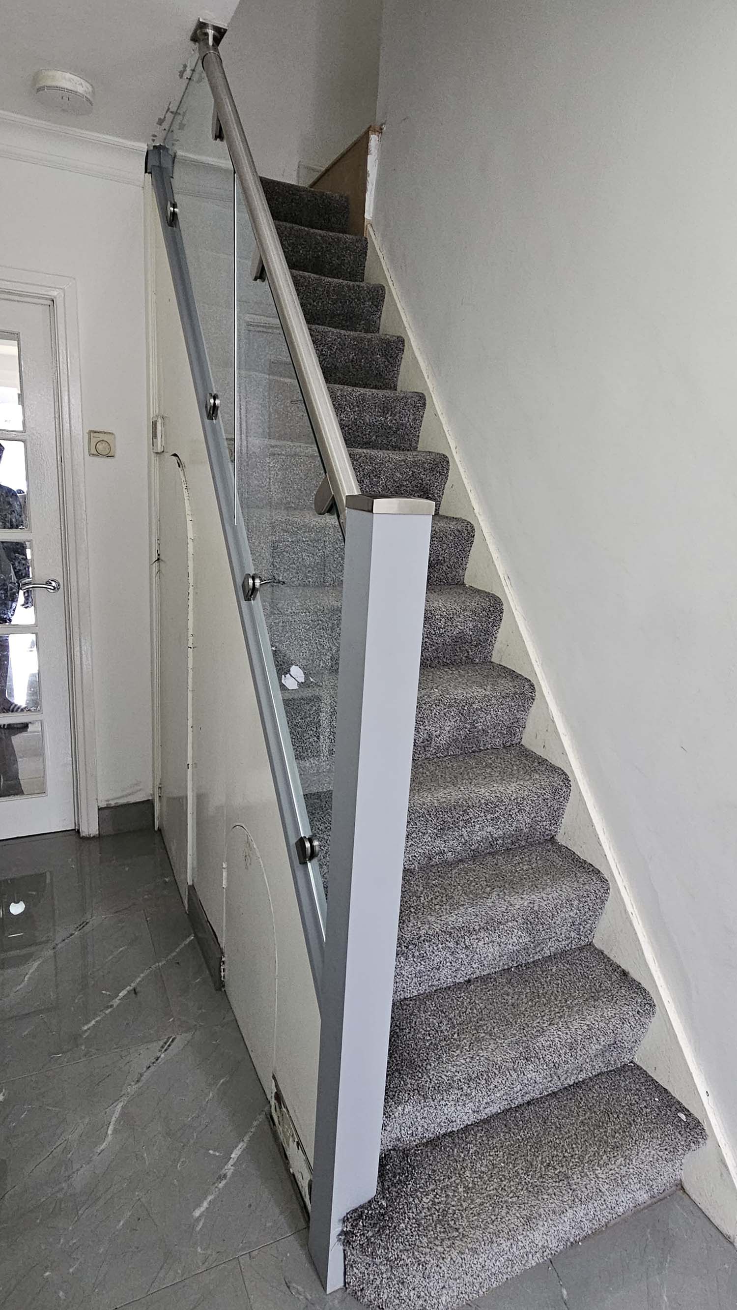 Grey and steel staircase